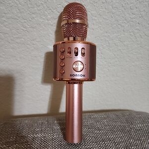 BONAOK wireless Bluetooth karaoke microphone Rose Gold.